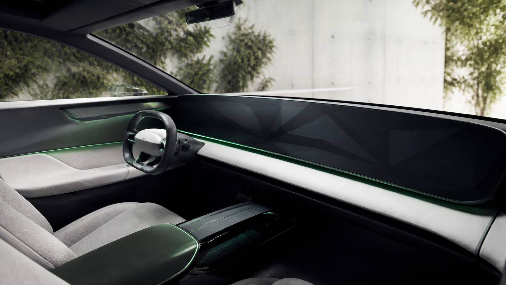 Intérieur de SUV conceptuel avec écran panoramique incurvé et volant minimaliste